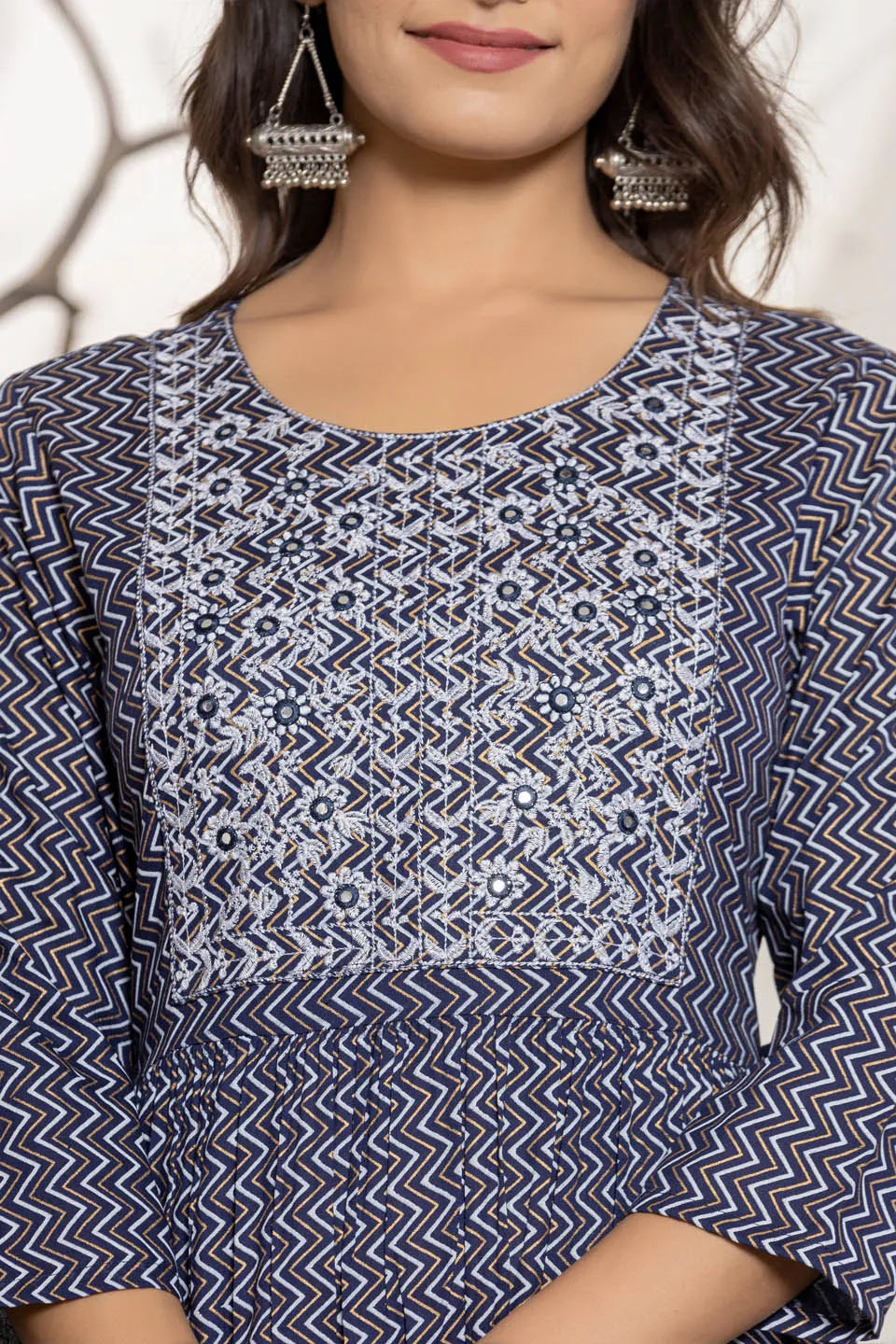 round neck flared kurta with zig zag pattern and front embroidered work