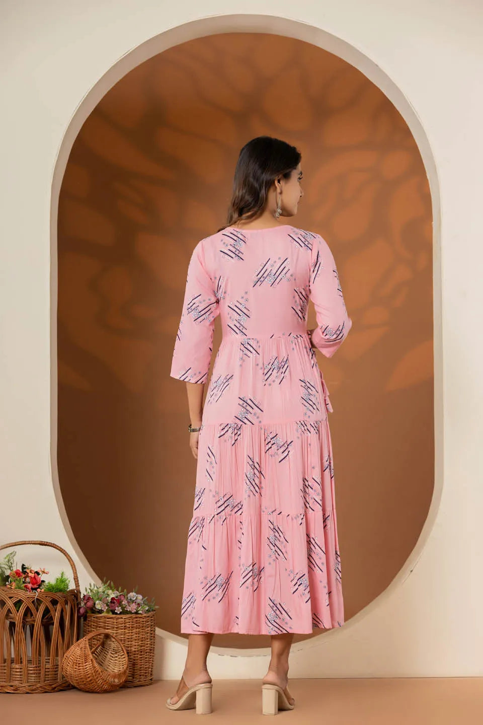 elegant pink ethnic dress with geometric print and tiered design