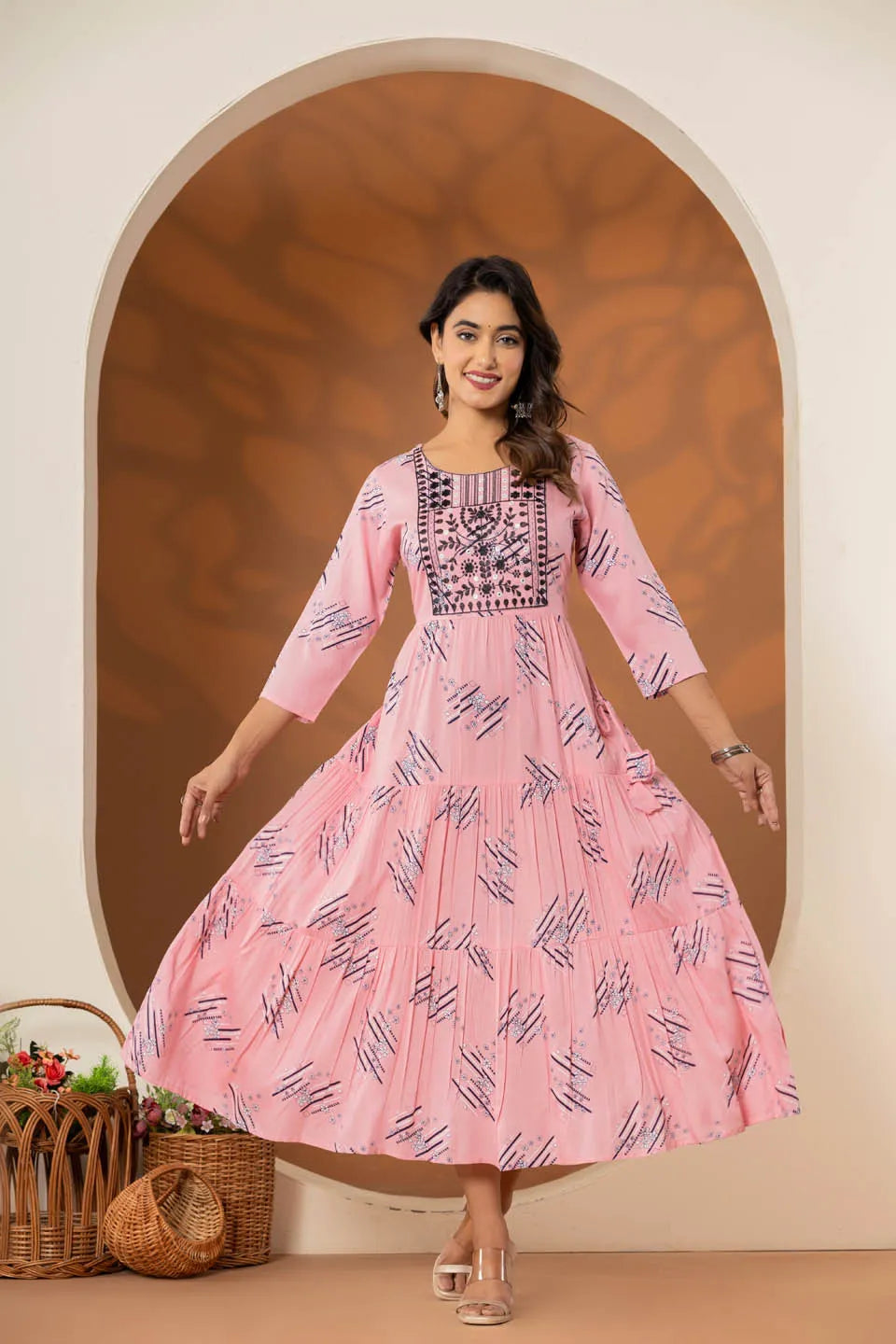elegant pink ethnic dress with geometric print and tiered design