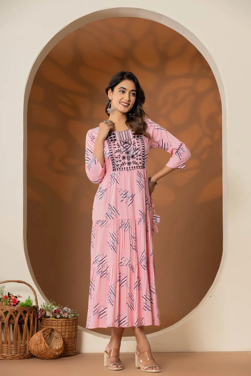 elegant pink ethnic dress with geometric print and tiered design