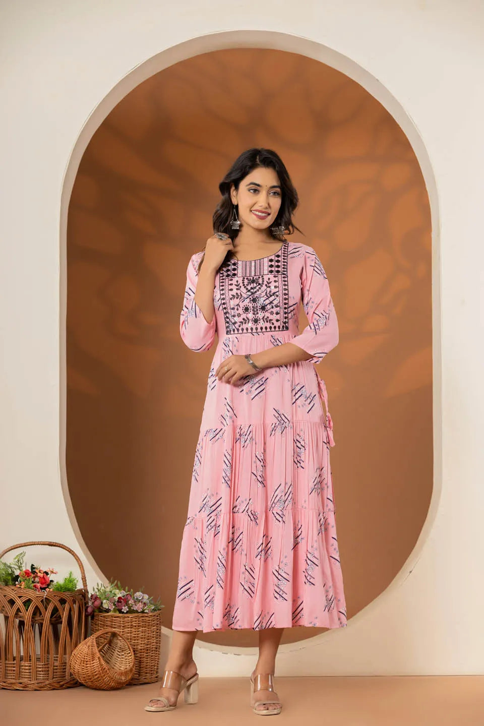 elegant pink ethnic dress with geometric print and tiered design
