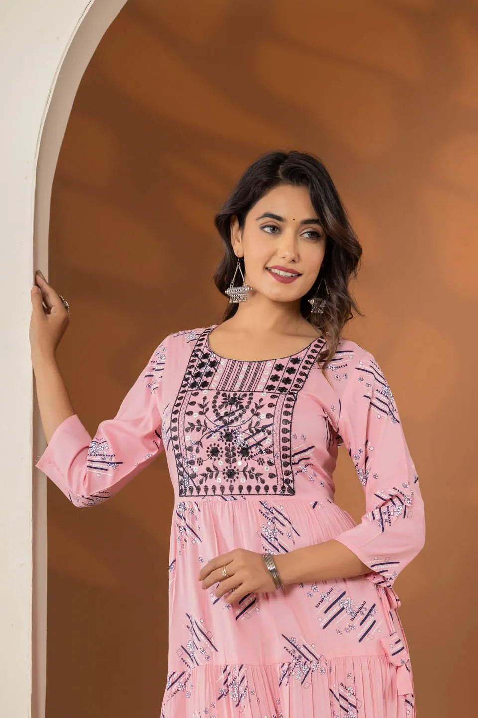 elegant pink ethnic dress with geometric print and tiered design