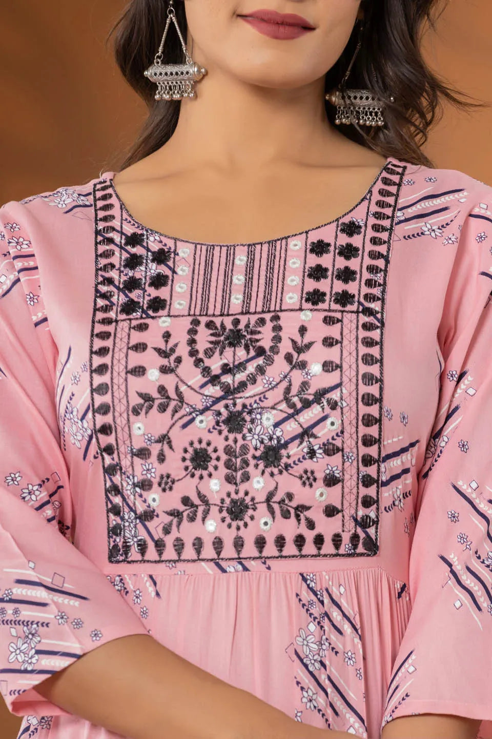 elegant pink ethnic dress with geometric print and tiered design
