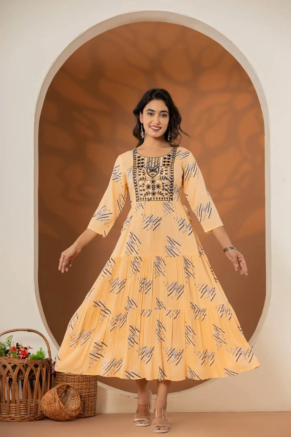 elegant pink ethnic dress with geometric print and tiered design
