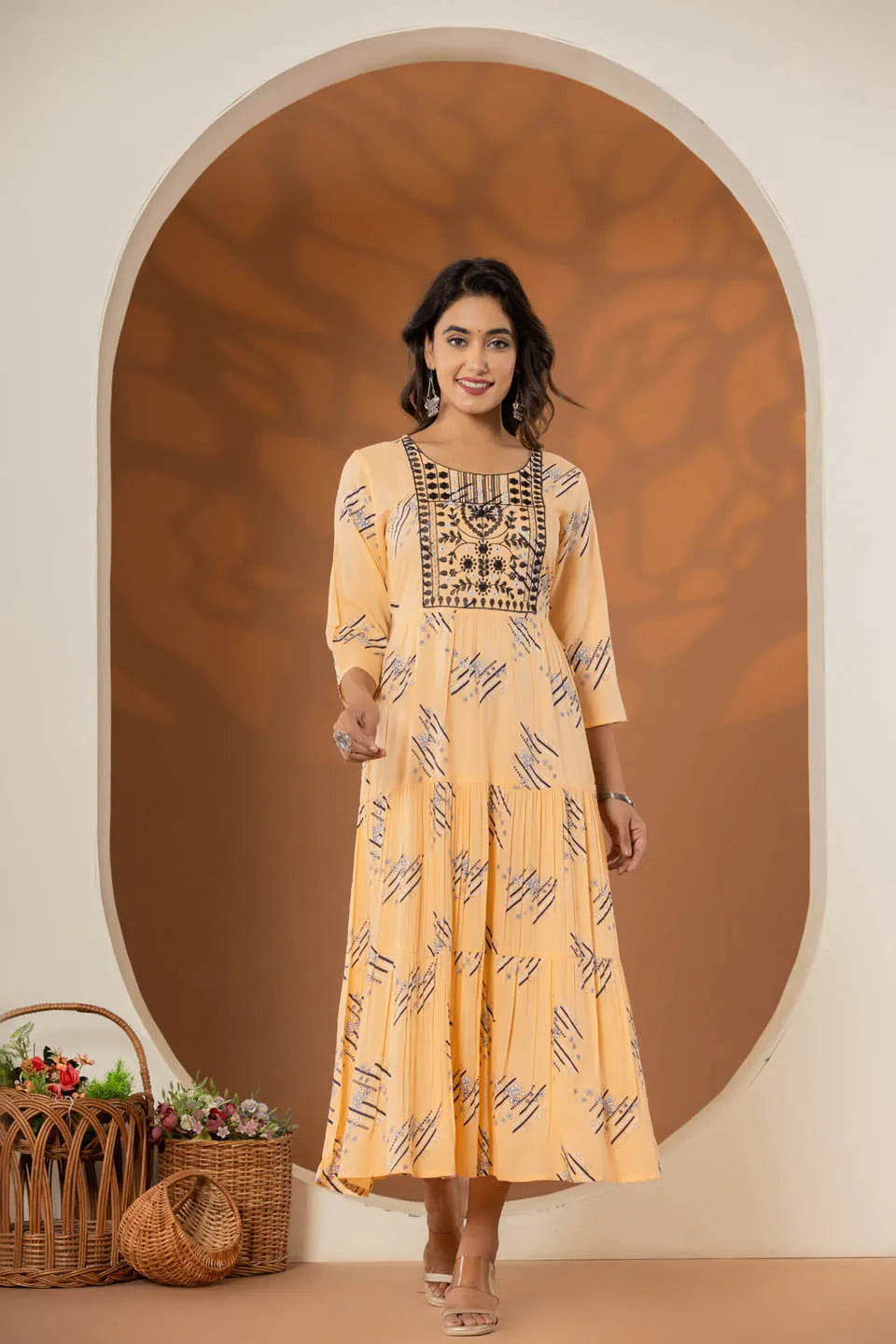 elegant pink ethnic dress with geometric print and tiered design