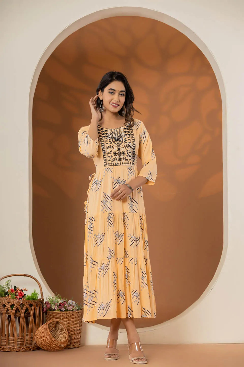 elegant pink ethnic dress with geometric print and tiered design
