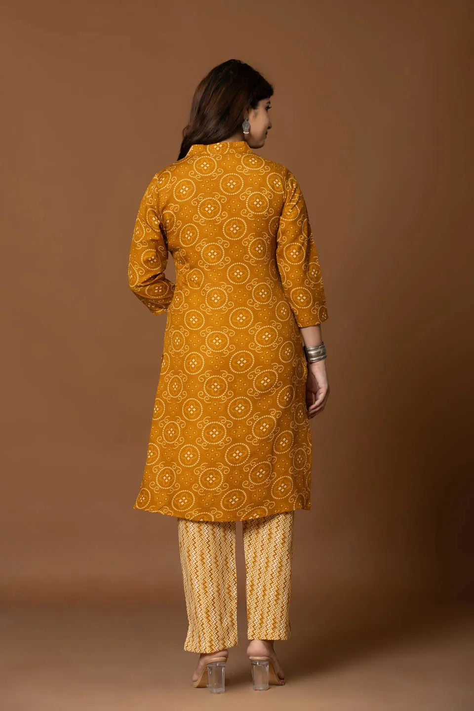 mustard bandhani kurta set with geometric pants