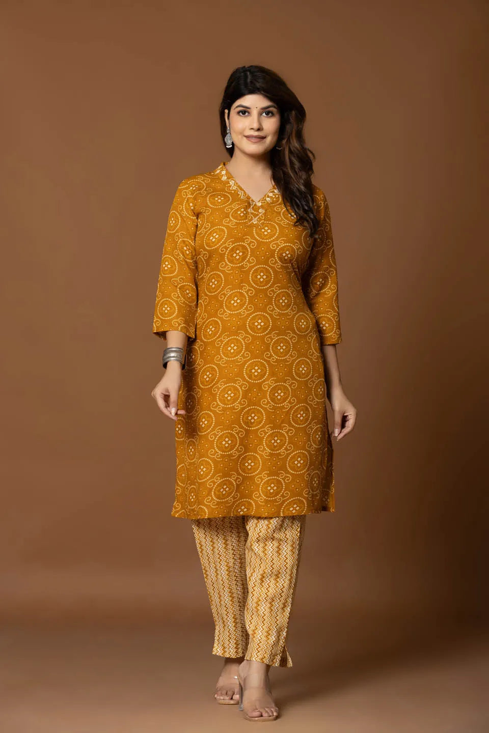 mustard bandhani kurta set with geometric pants