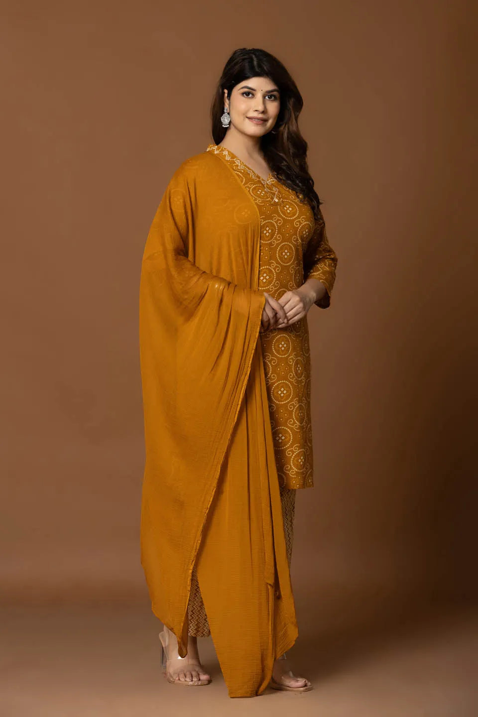 mustard bandhani kurta set with geometric pants