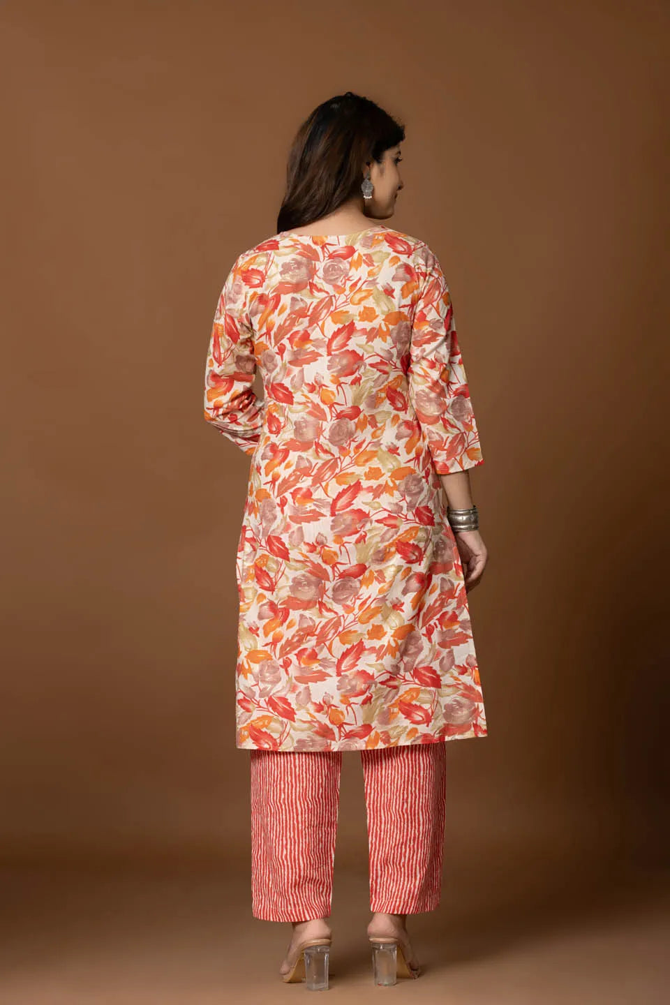 vibrant floral printed cotton kurta set with striped pants and dupatta