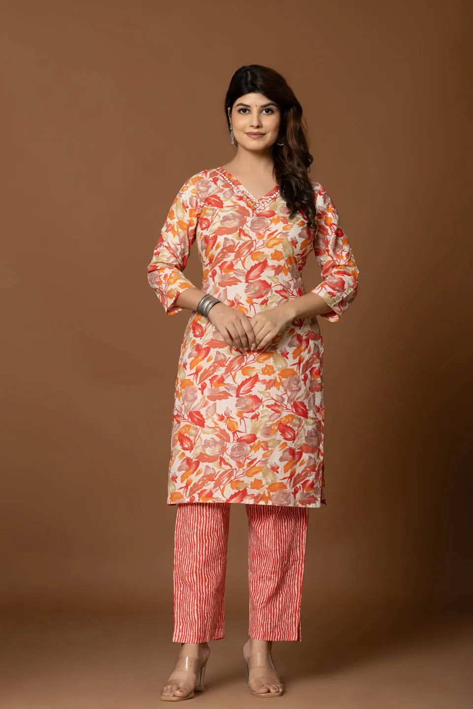 vibrant floral printed cotton kurta set with striped pants and dupatta