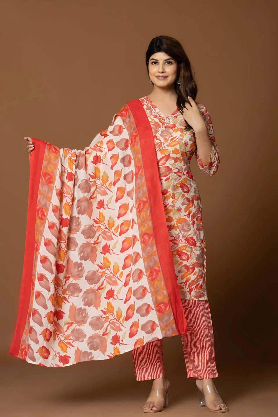 vibrant floral printed cotton kurta set with striped pants and dupatta