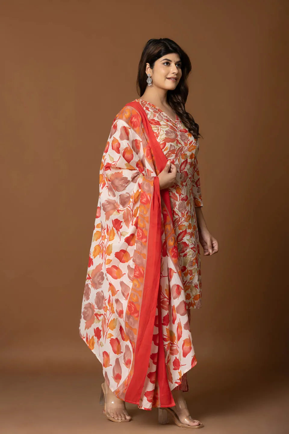 vibrant floral printed cotton kurta set with striped pants and dupatta