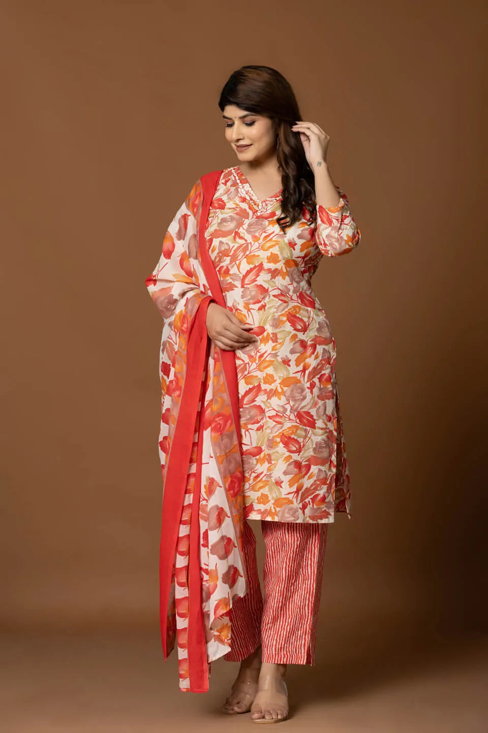 vibrant floral printed cotton kurta set with striped pants and dupatta