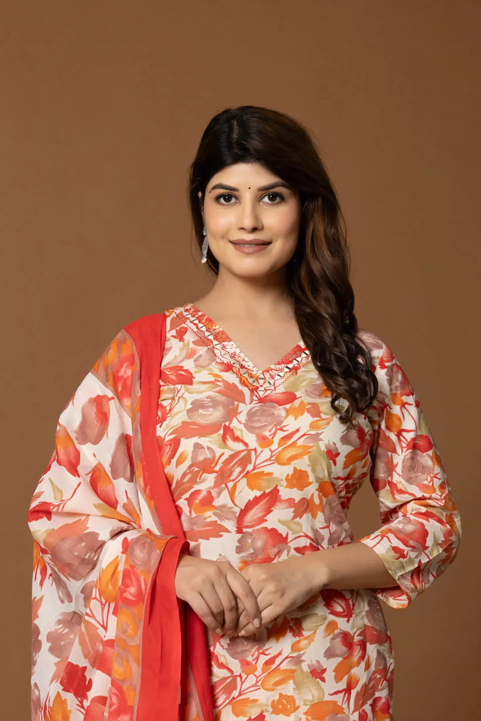 vibrant floral printed cotton kurta set with striped pants and dupatta