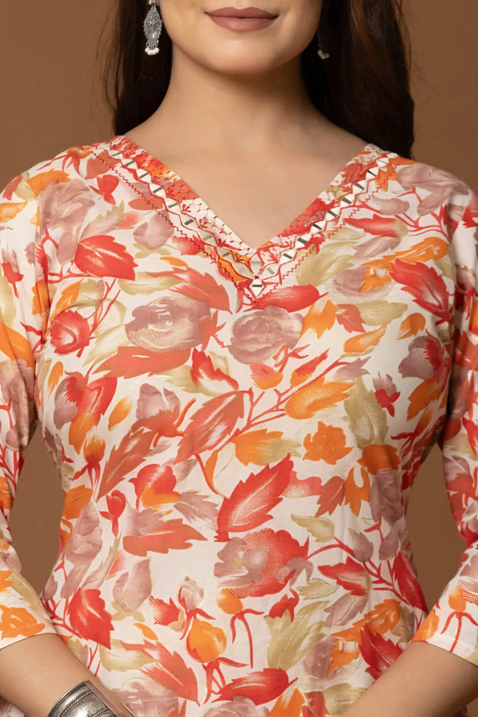 vibrant floral printed cotton kurta set with striped pants and dupatta