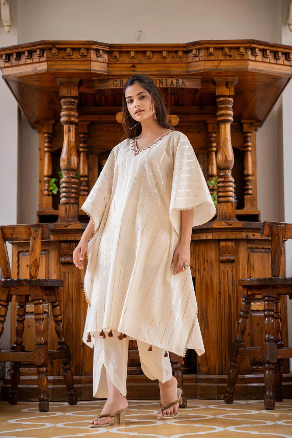 elegant kaftan style tunic with metallic stripes matching narrow pants