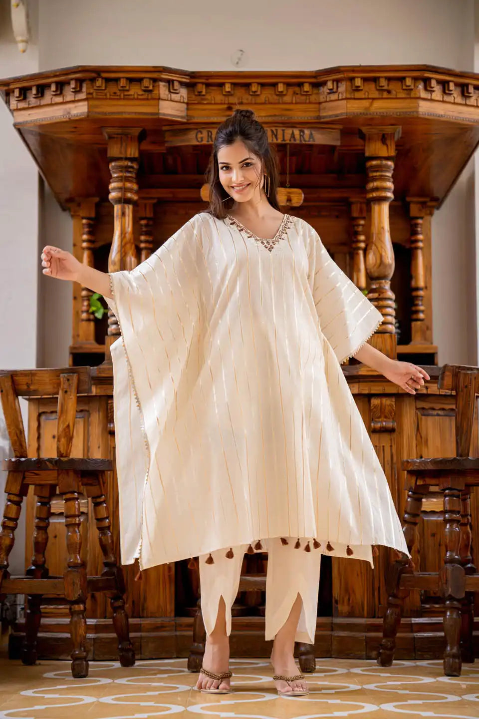 Off-white kaftan style kurta set with tassels & embroidery