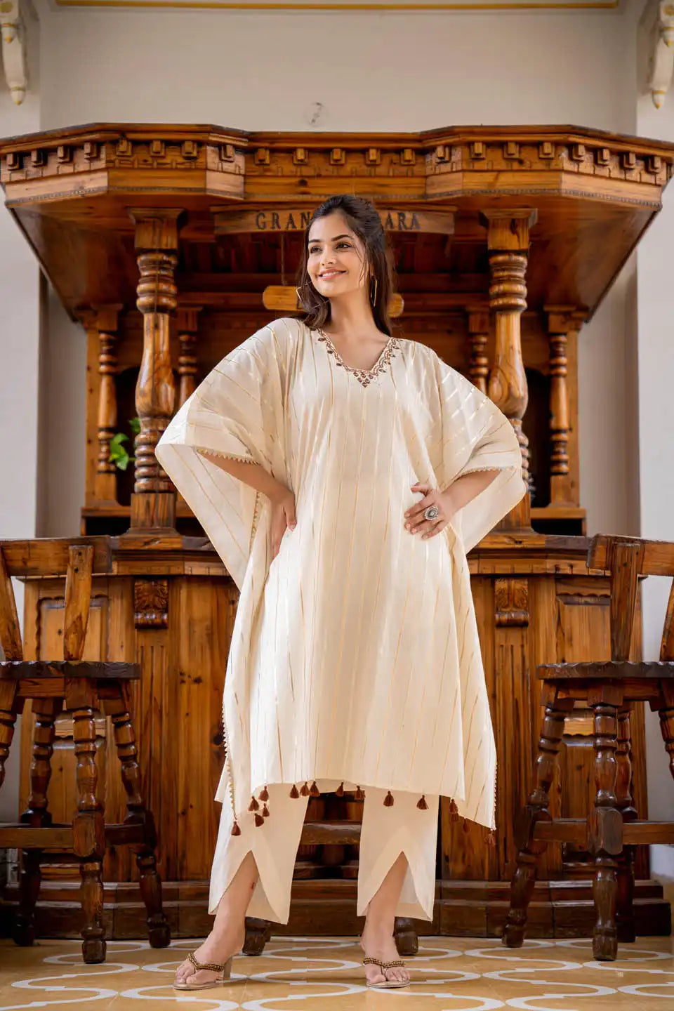Off-white kaftan style kurta set with tassels & embroidery