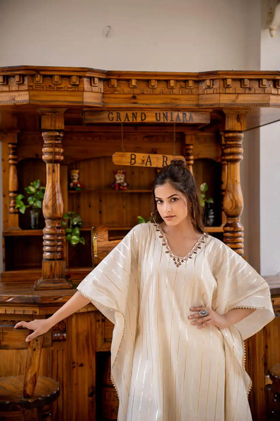 Off-white kaftan style kurta set with tassels & embroidery