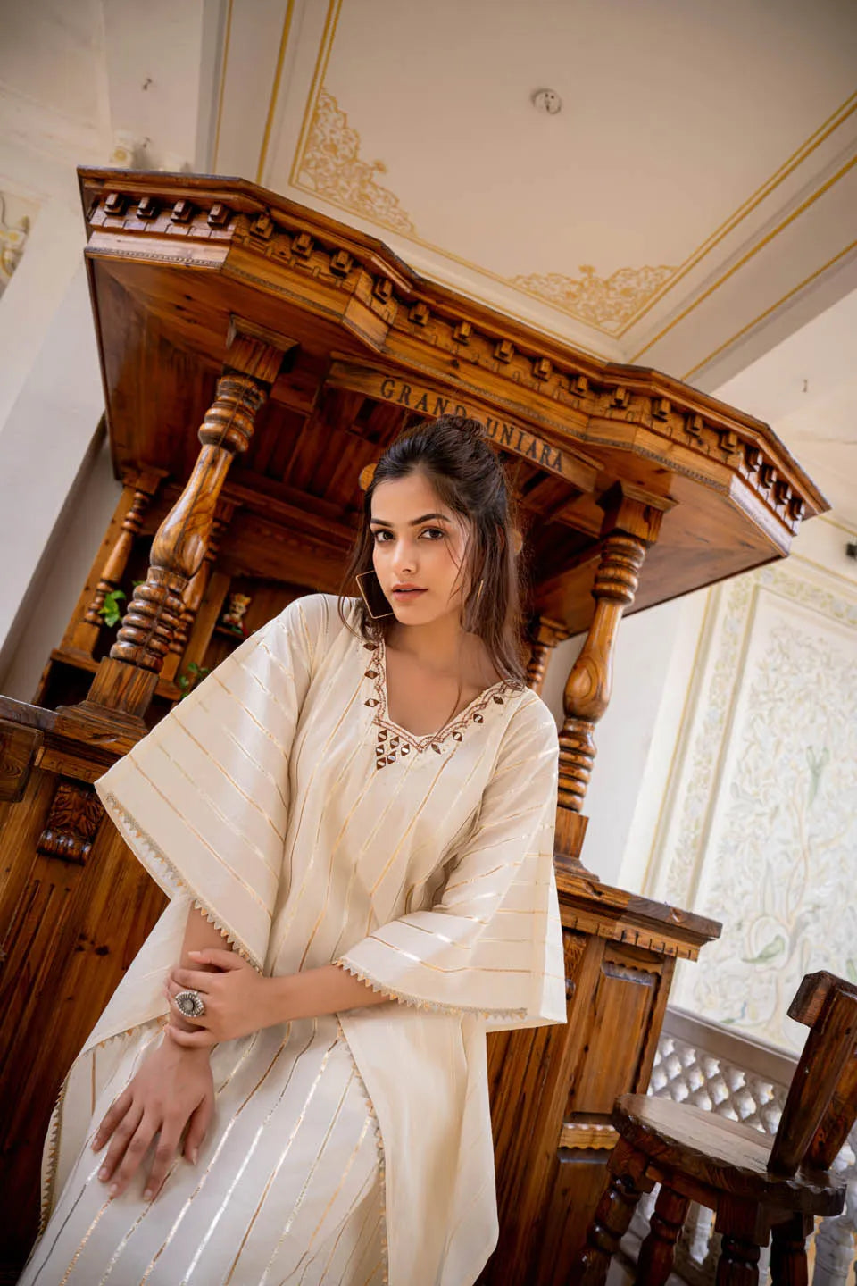 elegant kaftan style tunic with metallic stripes matching narrow pants