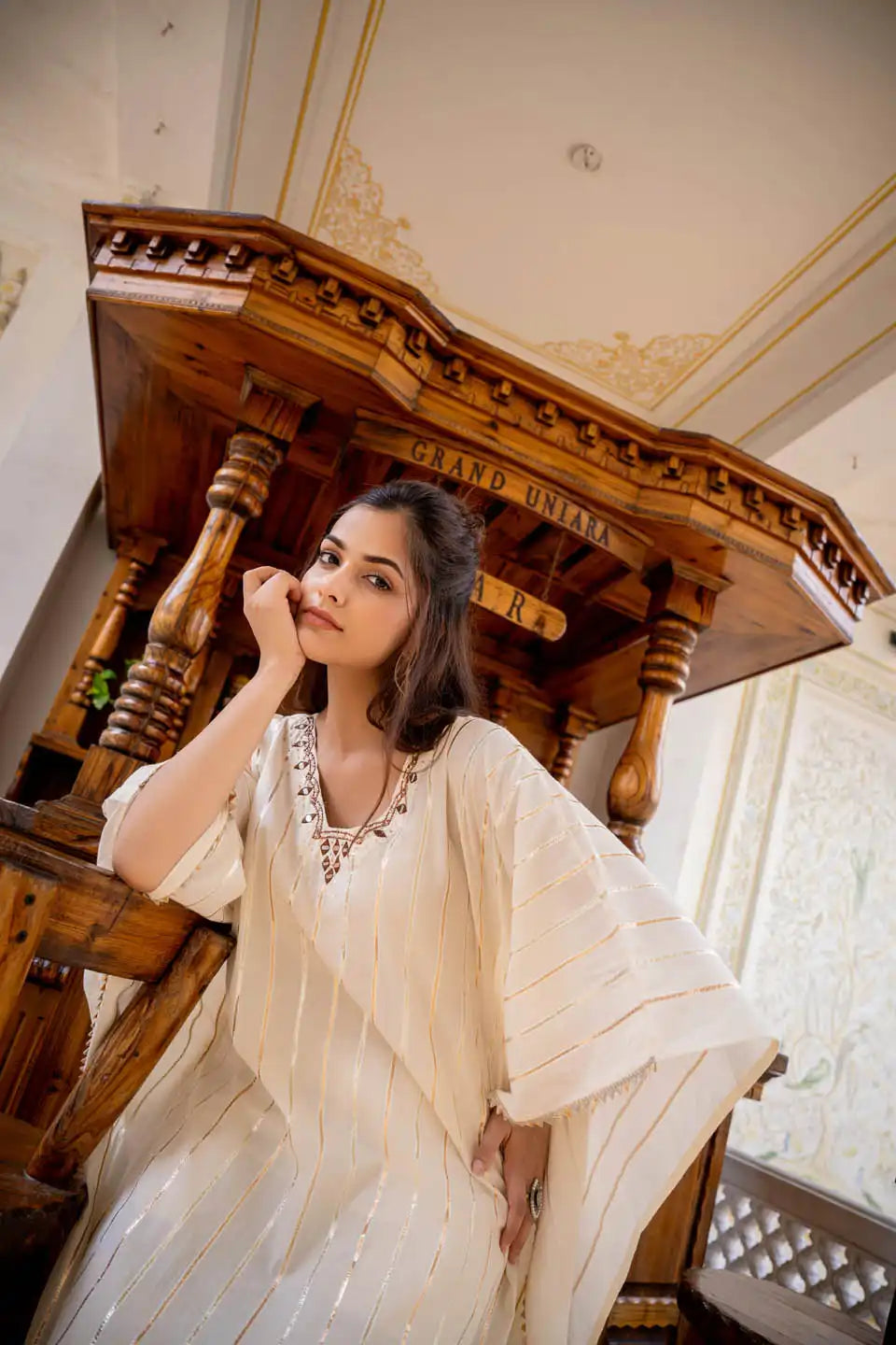 Off-white kaftan style kurta set with tassels & embroidery