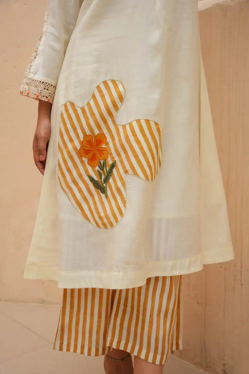 off-white co ord set with floral patchwork and striped palazzo
