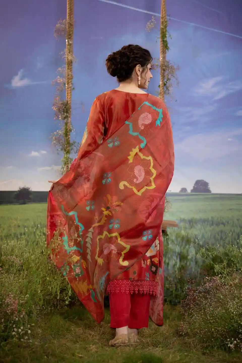 Rust red geometric print shimmer tissue kurta set with dupatta
