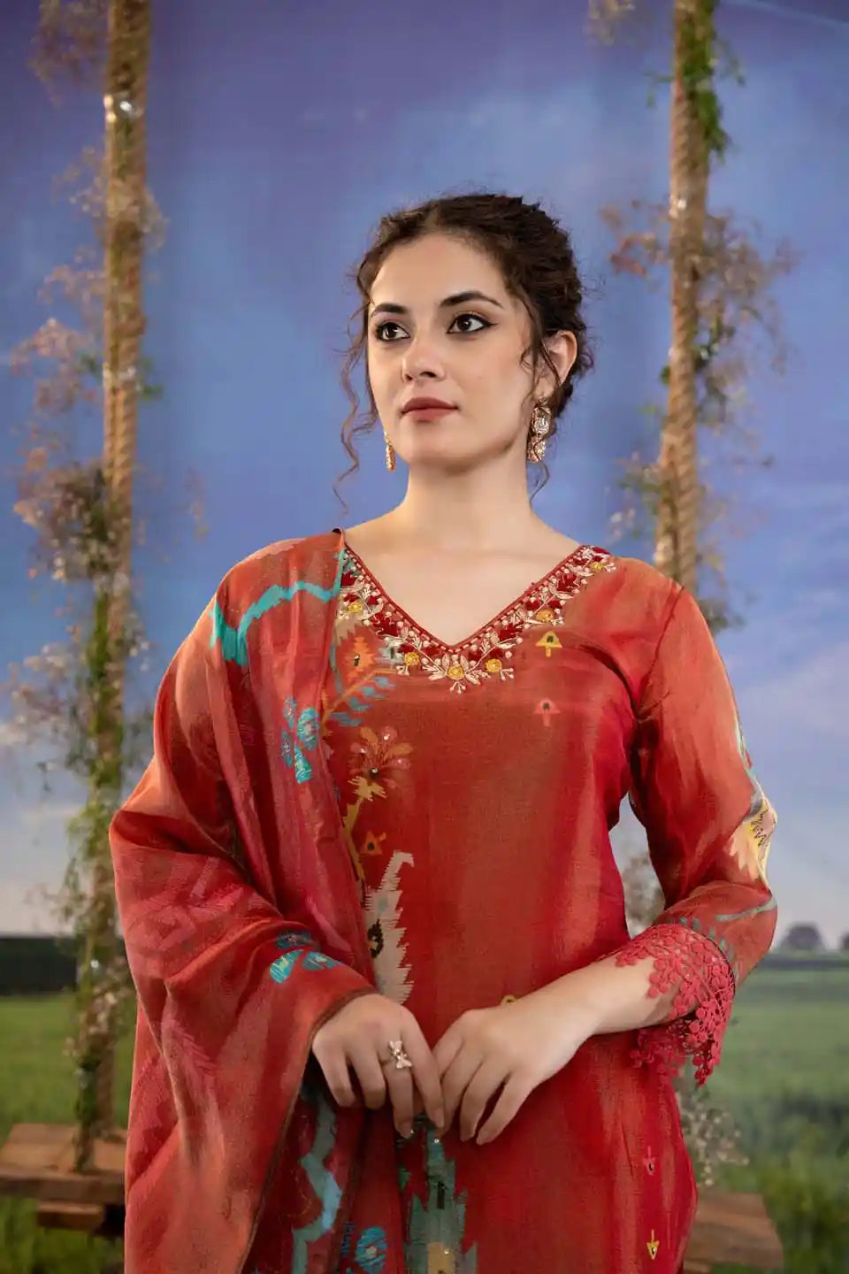 Rust red geometric print shimmer tissue kurta set with dupatta