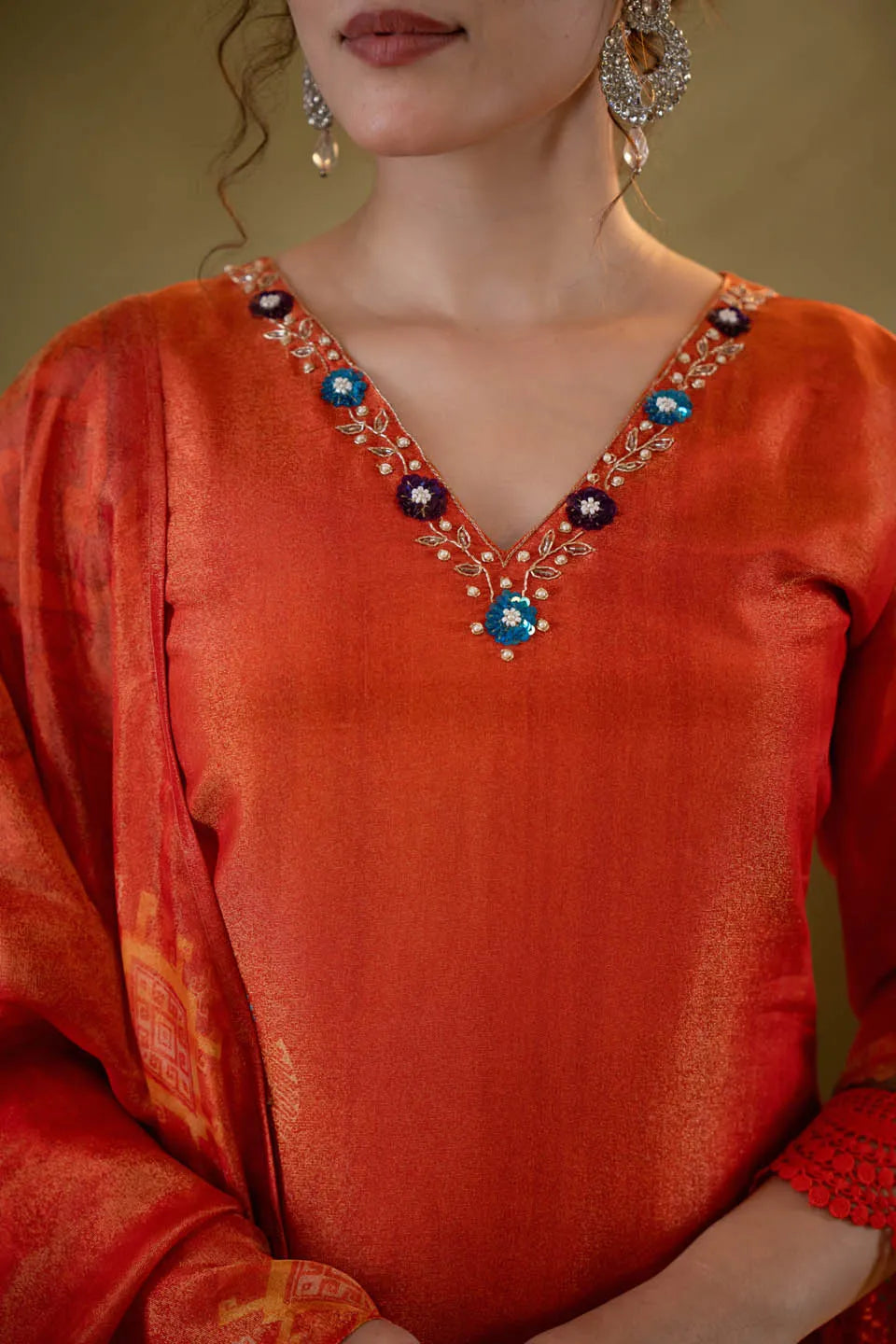 festive orange embellished kurta set with floral dupatta straight pants