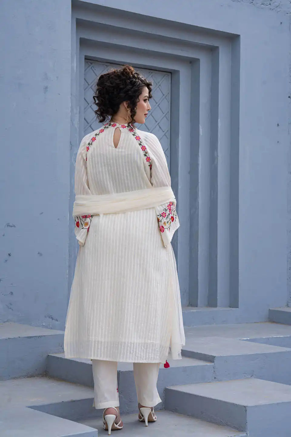 elegant off-white embroidered kurta set