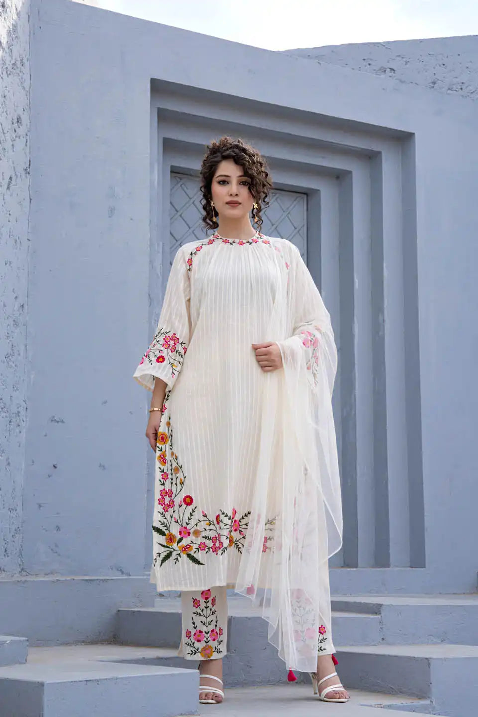 elegant off-white embroidered kurta set