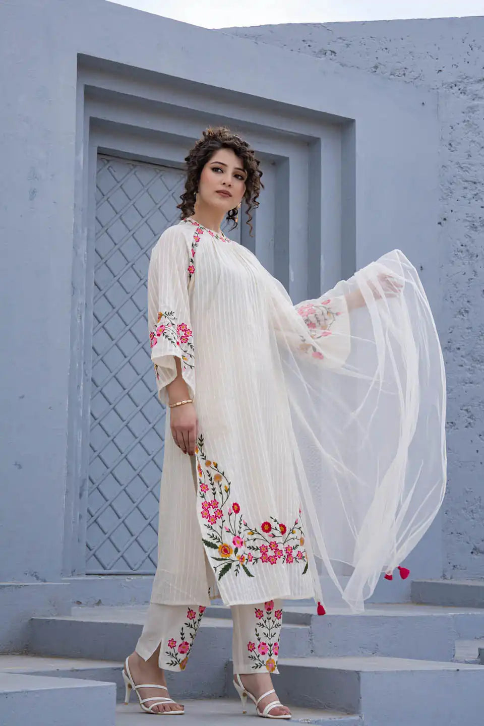 elegant off-white embroidered kurta set