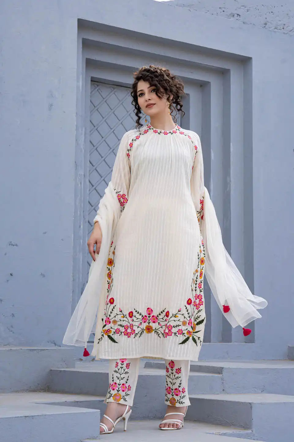 elegant off-white embroidered kurta set