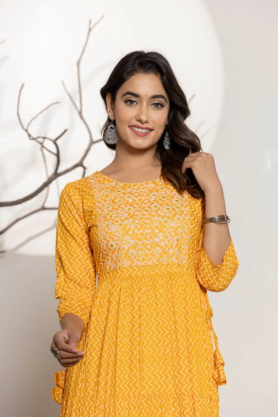 round neck flared kurta with zig zag pattern and front embroidered work