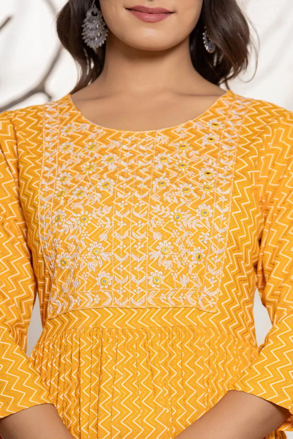 round neck flared kurta with zig zag pattern and front embroidered work