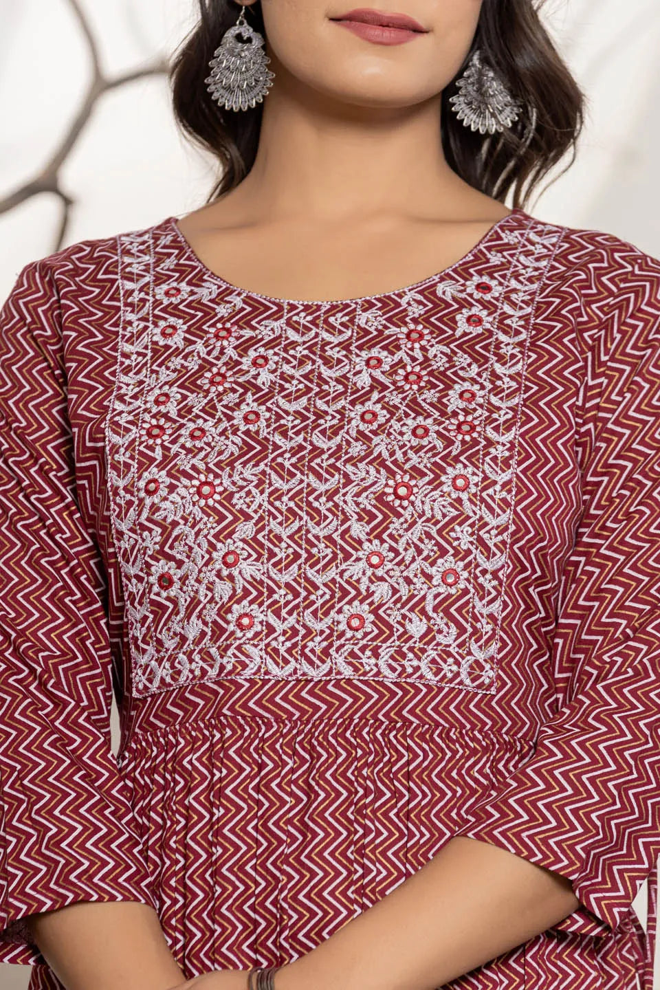 round neck flared kurta with zig zag pattern and front embroidered work