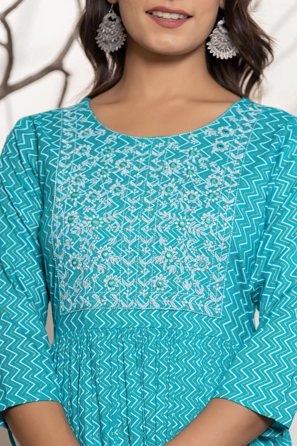 round neck flared kurta with zig zag pattern and front embroidered work