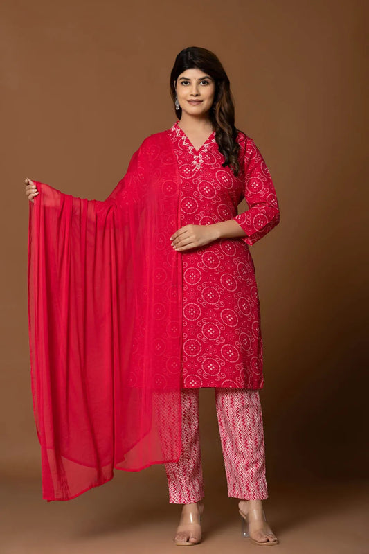 red bandhani printed kurta set with geometric patterned pants and dupatta