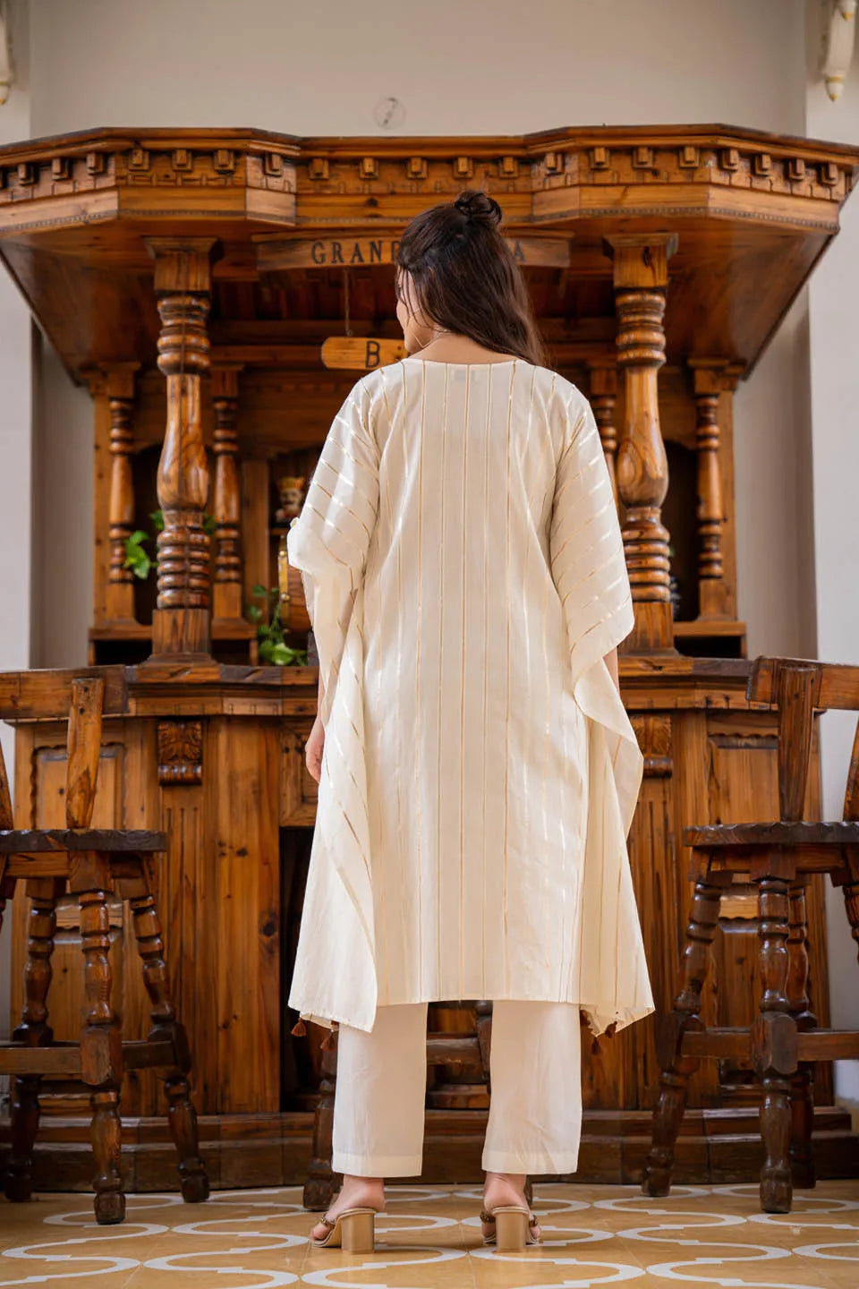 elegant kaftan style tunic with metallic stripes matching narrow pants
