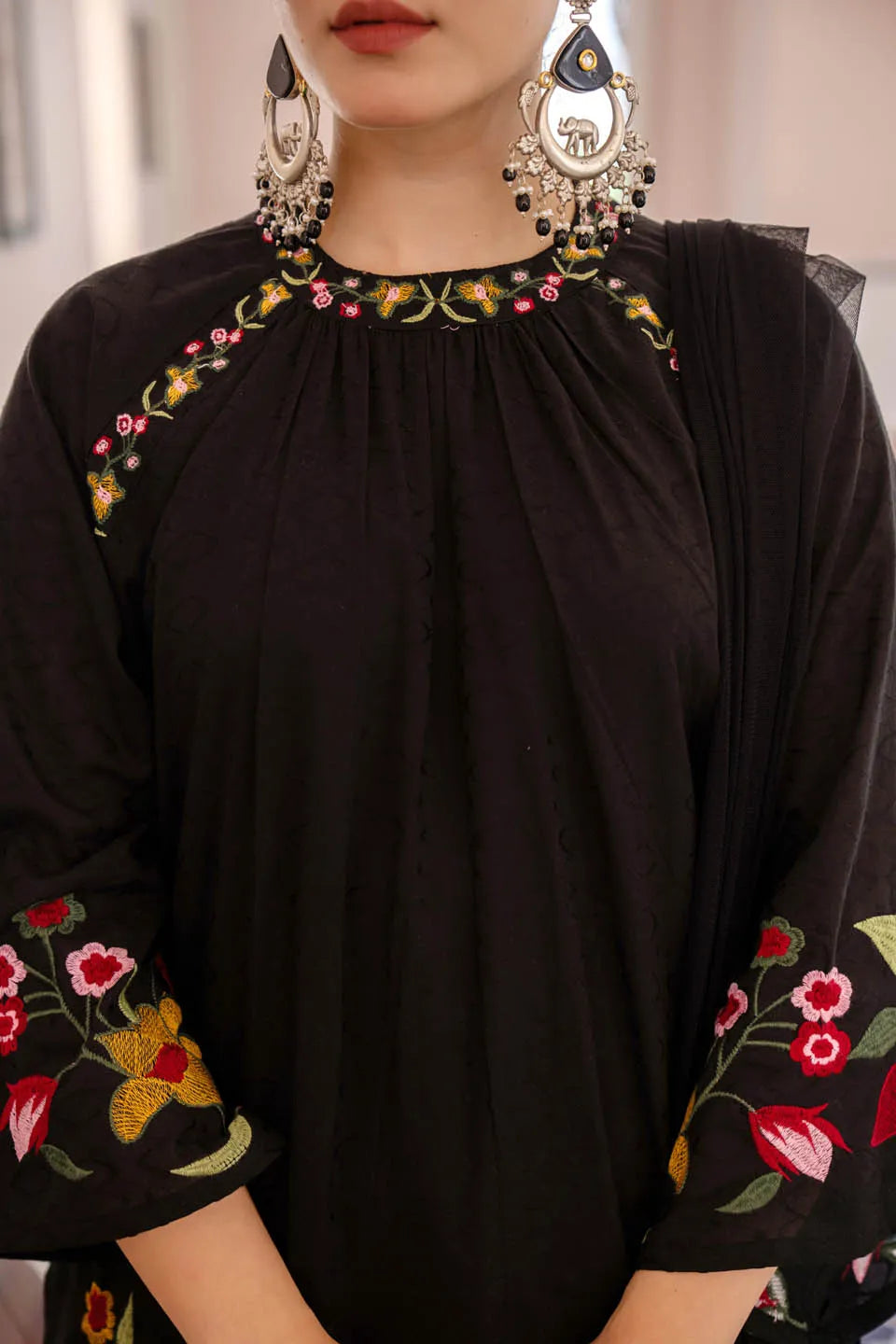 black coton kurta set with floral embroidery and straight pants
