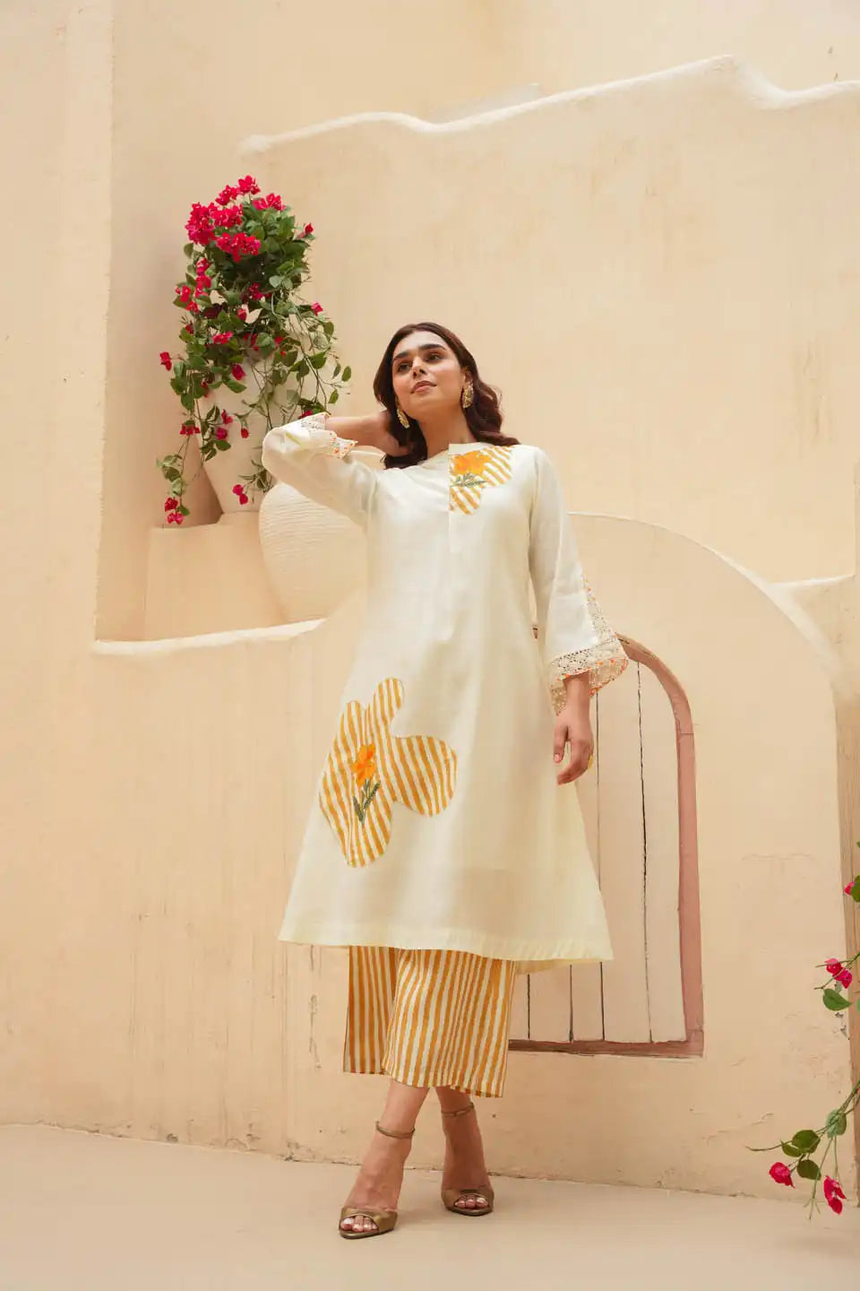 off-white co ord set with floral patchwork and striped palazzo