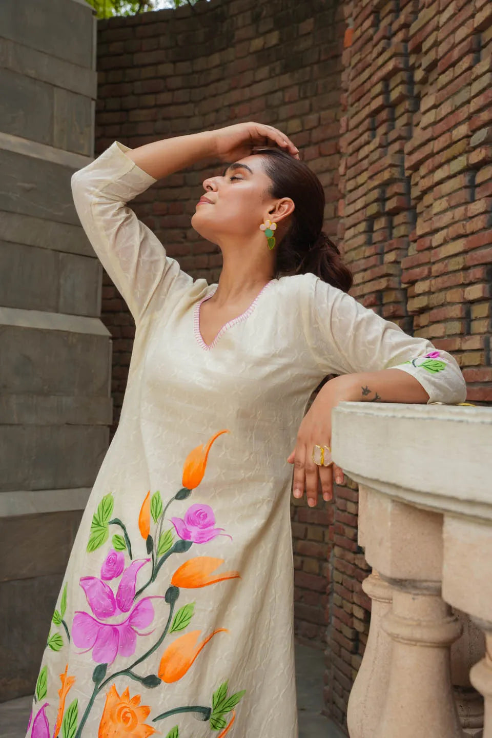 elegant cream coord set with vibrant floral print 3 4th sleeves festive casual wear